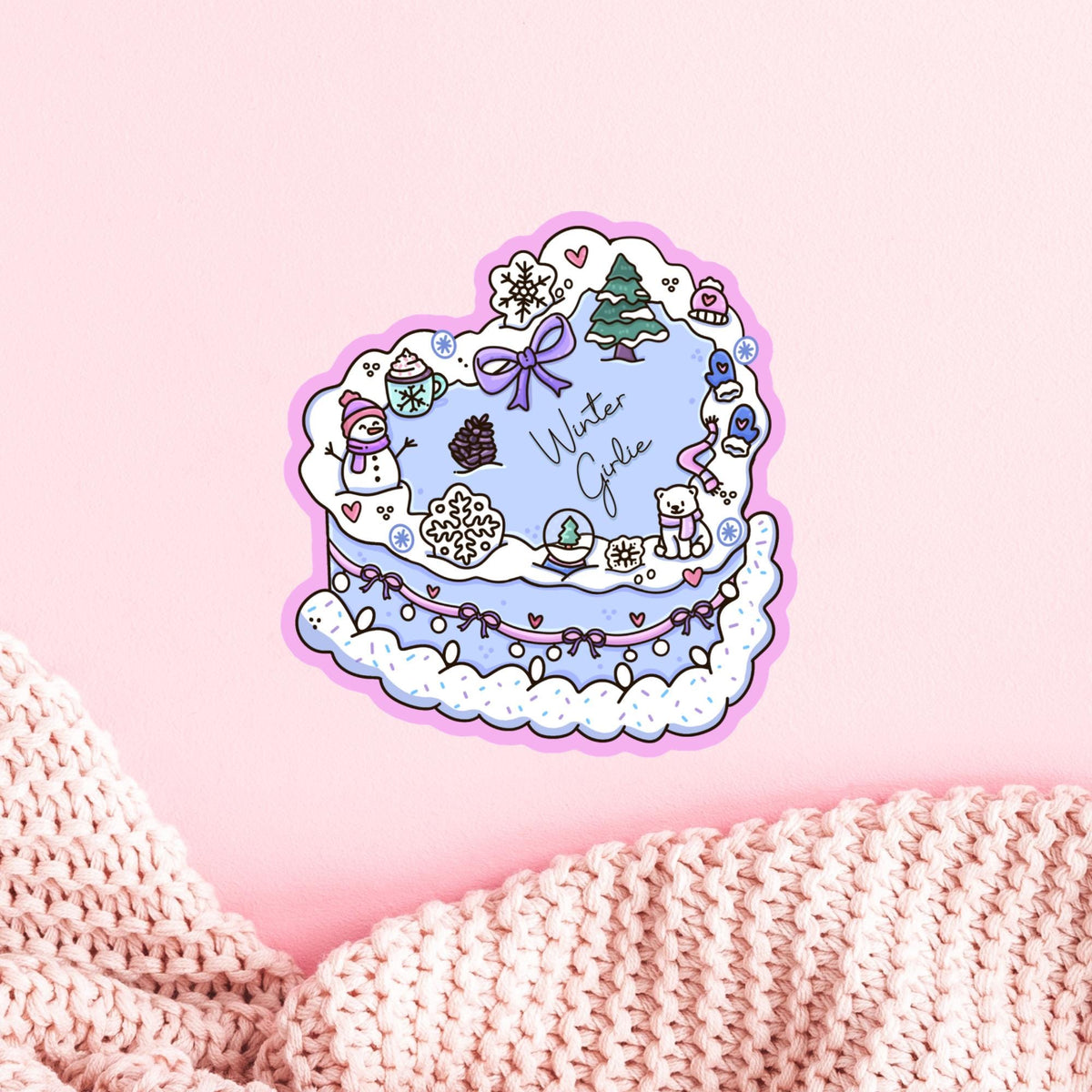 Winter Girlie Cake vinyl sticker on a pink planner page, kawaii pastel aesthetic decal for journals and stationery lovers