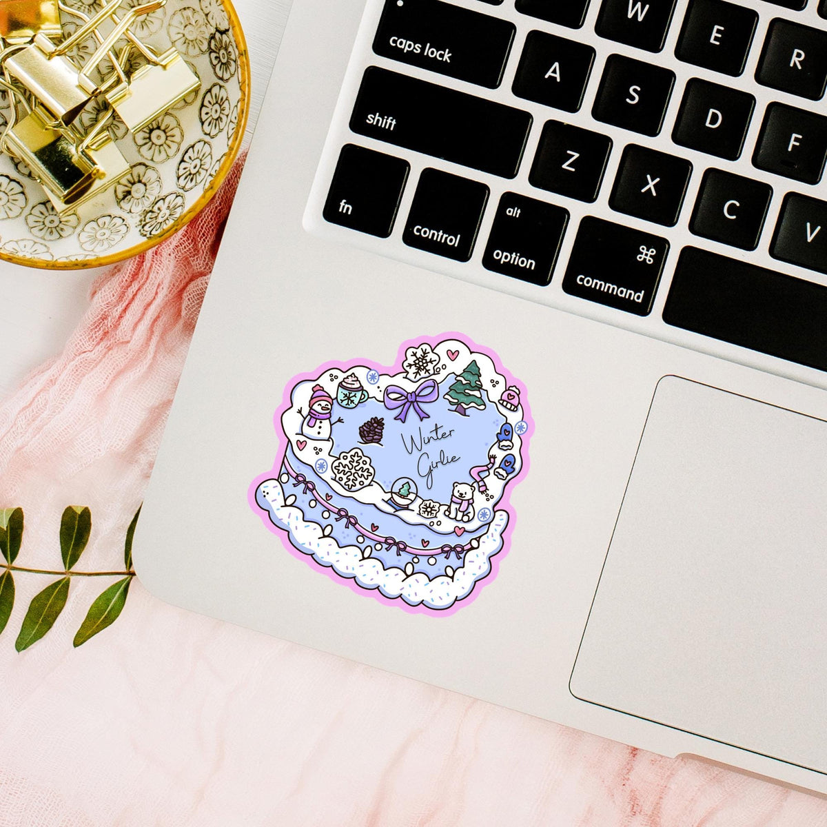 Winter Girlie Cake sticker on a laptop lid, waterproof vinyl decal, cute snowy woodland cozy aesthetic gift for desk decor