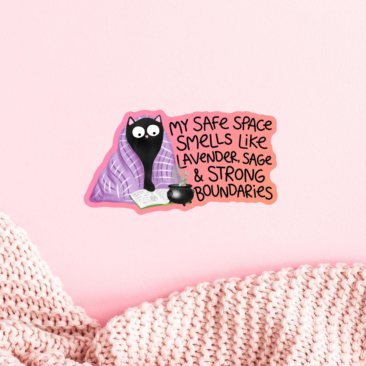 Black cat lavender blanket sticker on a pink planner