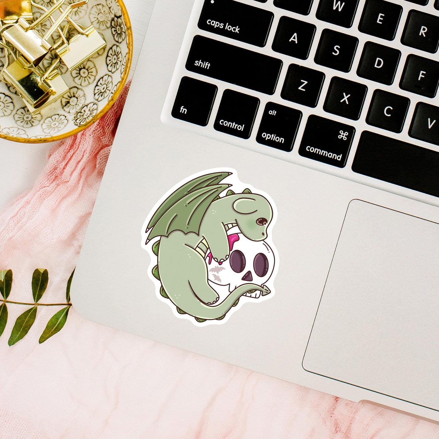 Green Halloween Dragon die-cut sticker lifestyle photo, waterproof vinyl sticker for witchy aesthetic book lovers