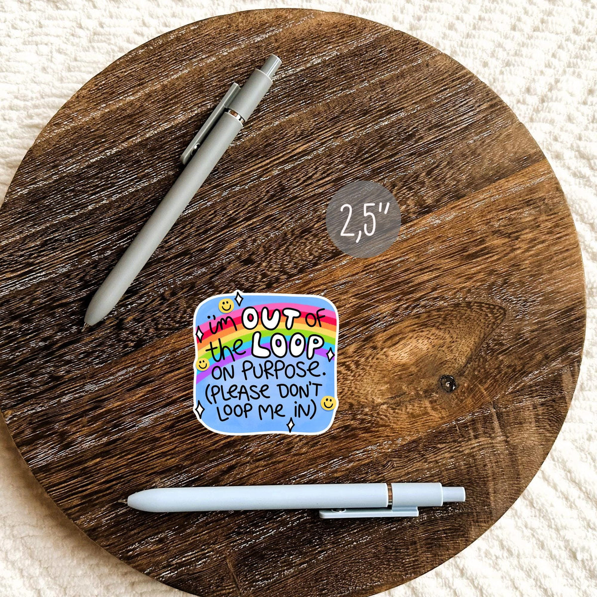 I'm Out Of The Loop On Purpose die-cut sticker on a wooden planner, colorful aesthetic decal for journals and desk decor