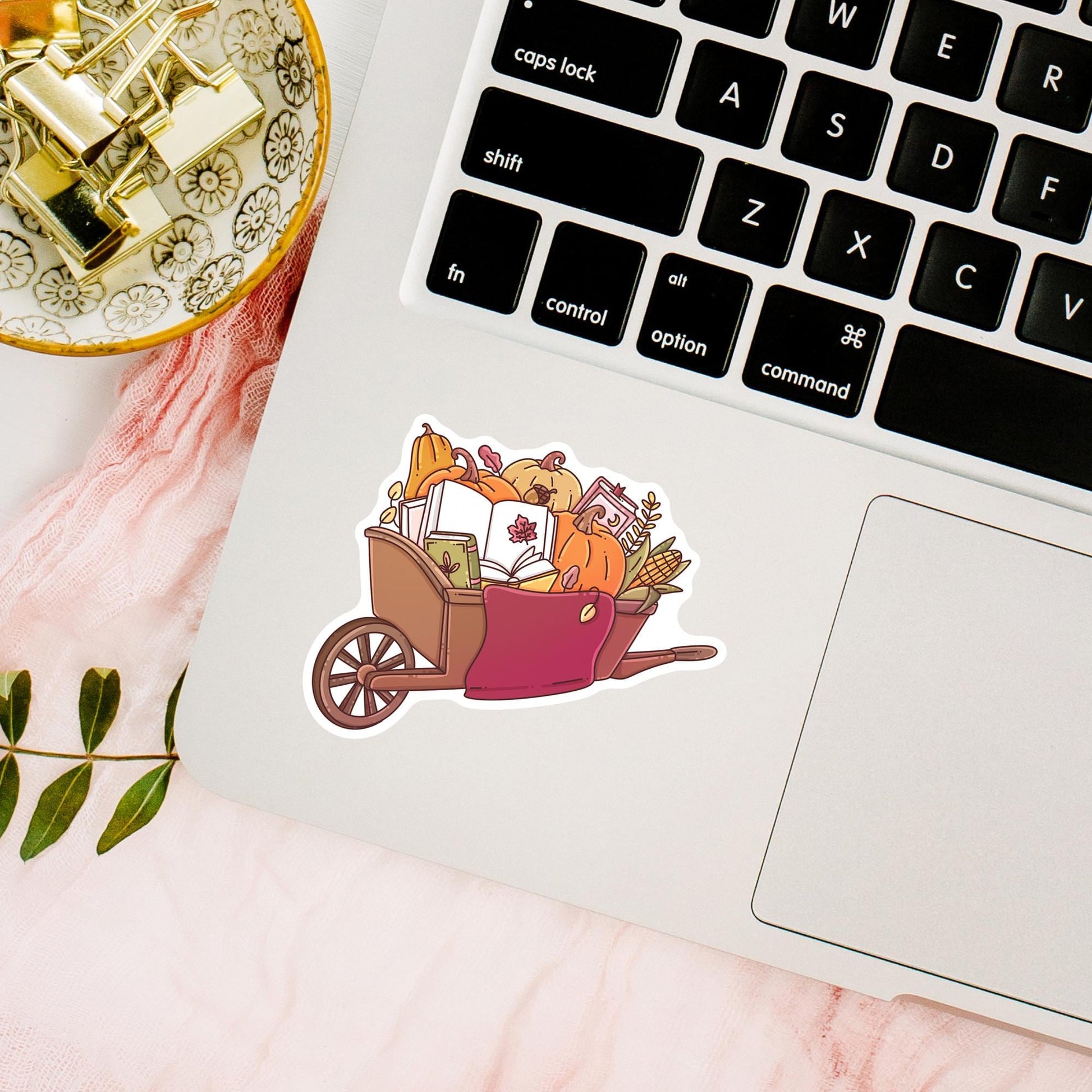 Autumn bookish sticker on a phone case, cozy fall aesthetic vinyl sticker gift for bibliophiles and seasonal readers