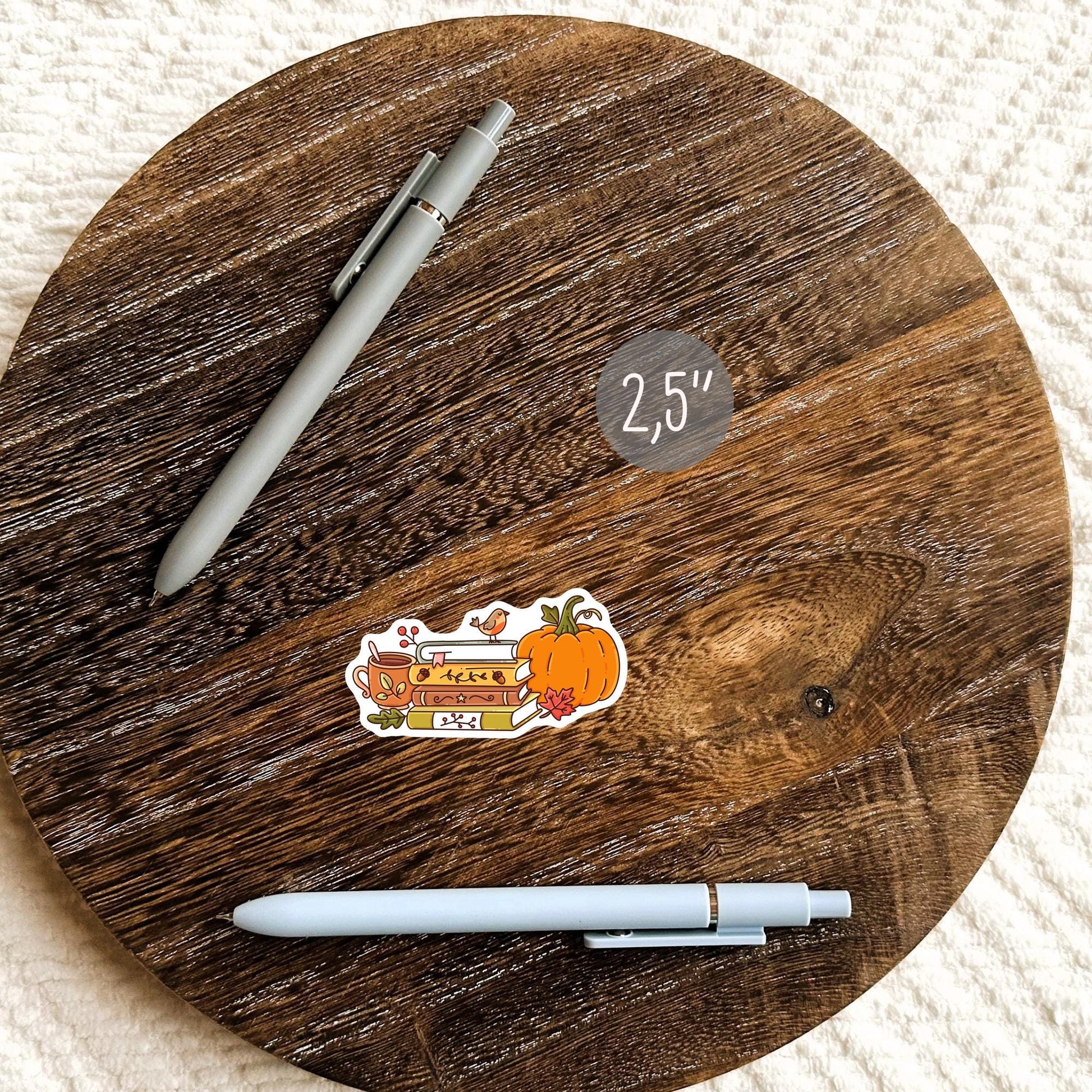 Bookish Autumn sticker on planner or journal close-up, autumn aesthetic die-cut vinyl waterproof decal stationery enthusiast