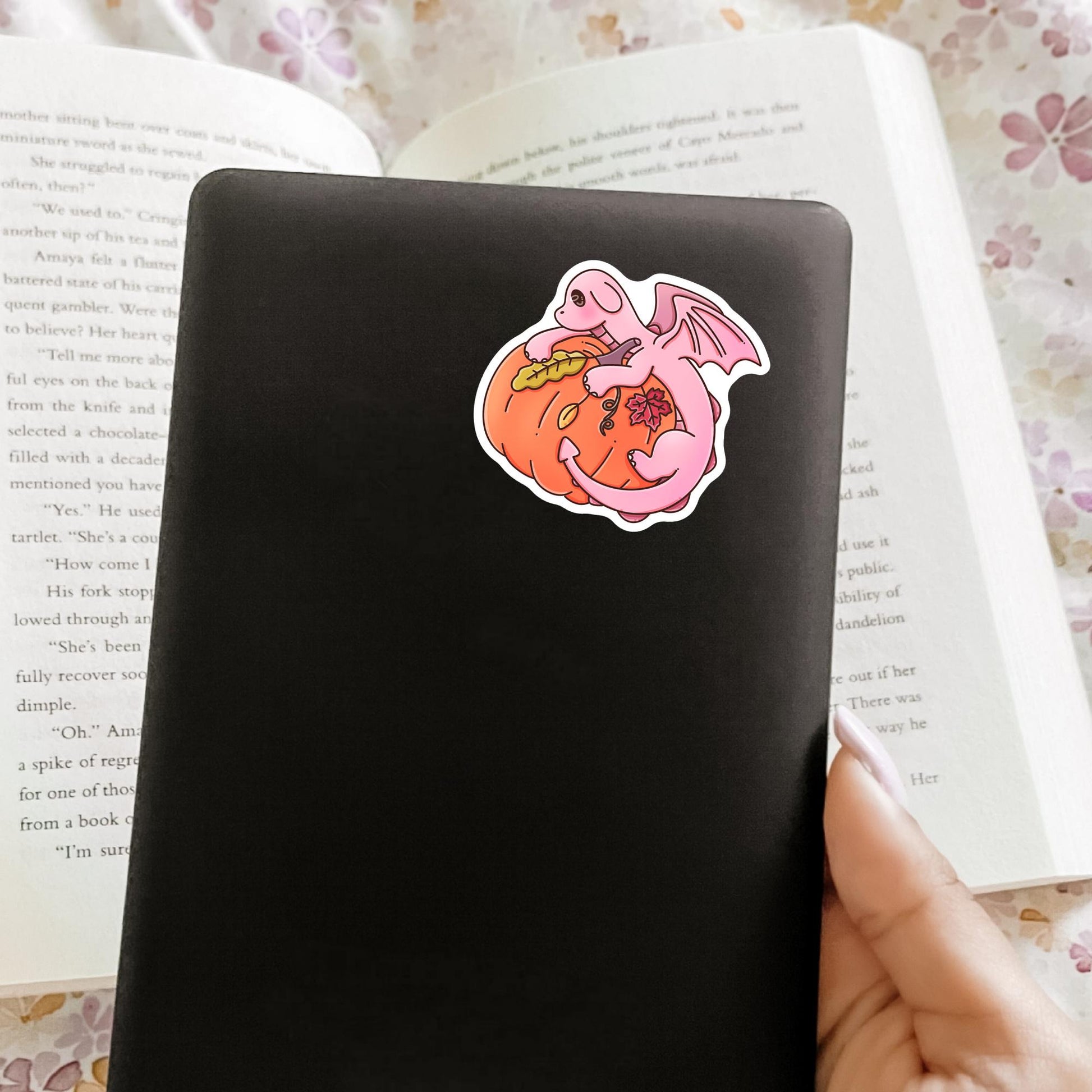 Autumn pink dragon book lover sticker lifestyle photo, cozy fall die-cut waterproof sticker for Kindle and planner decoration