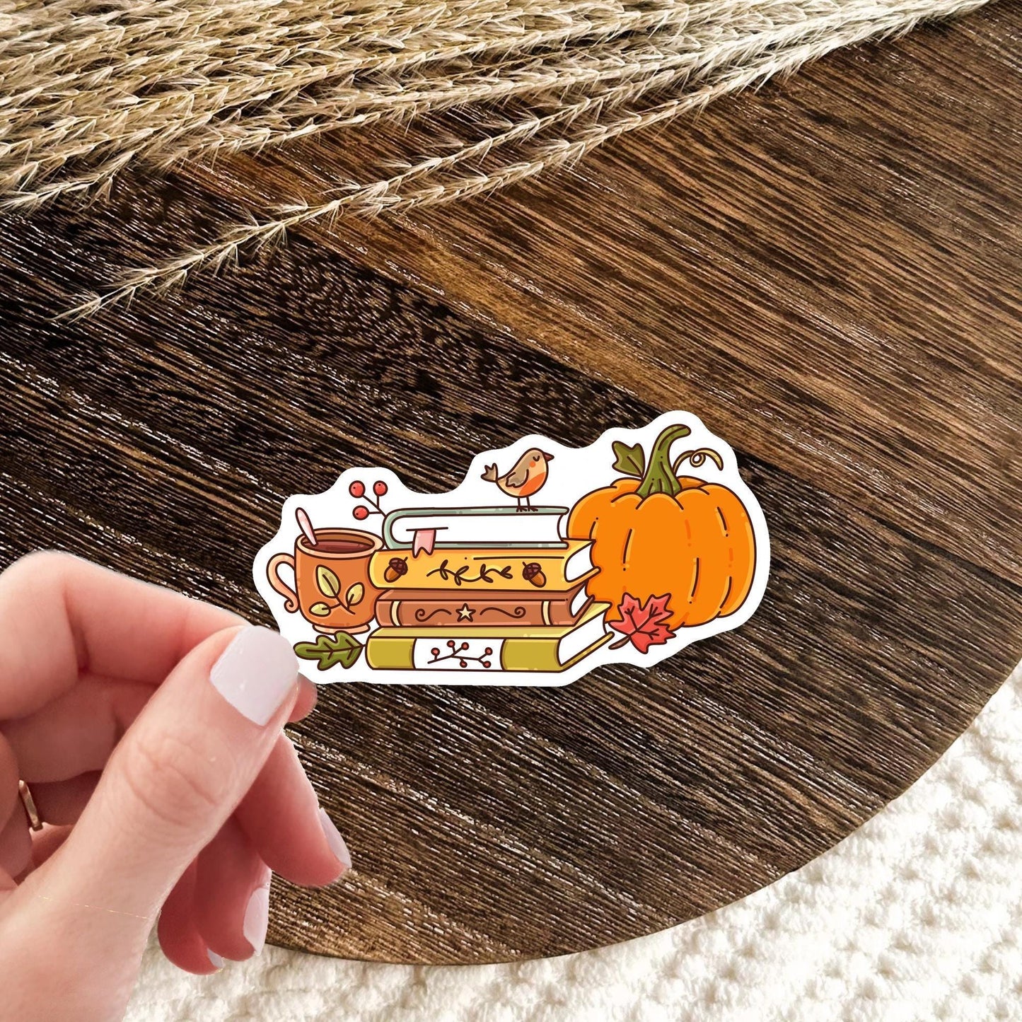 Bookish Autumn die-cut vinyl sticker lifestyle photo, cozy fall reading aesthetic waterproof decal gift for book lovers