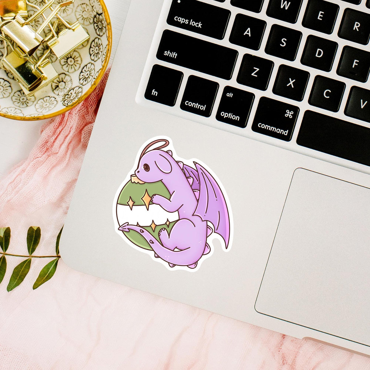 Cute Ornament Dragon vinyl sticker on a laptop keyboard, waterproof Christmas fantasy decal for laptops, planners and holiday desk decor