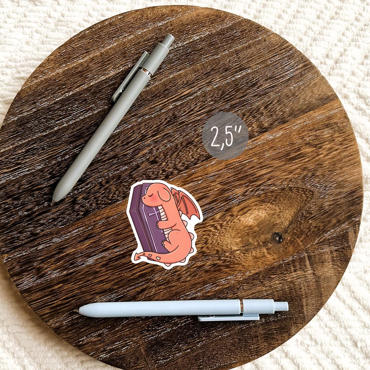 Halloween Orange Dragon sticker lifestyle mockup - cute spooky dragon gift for book lovers