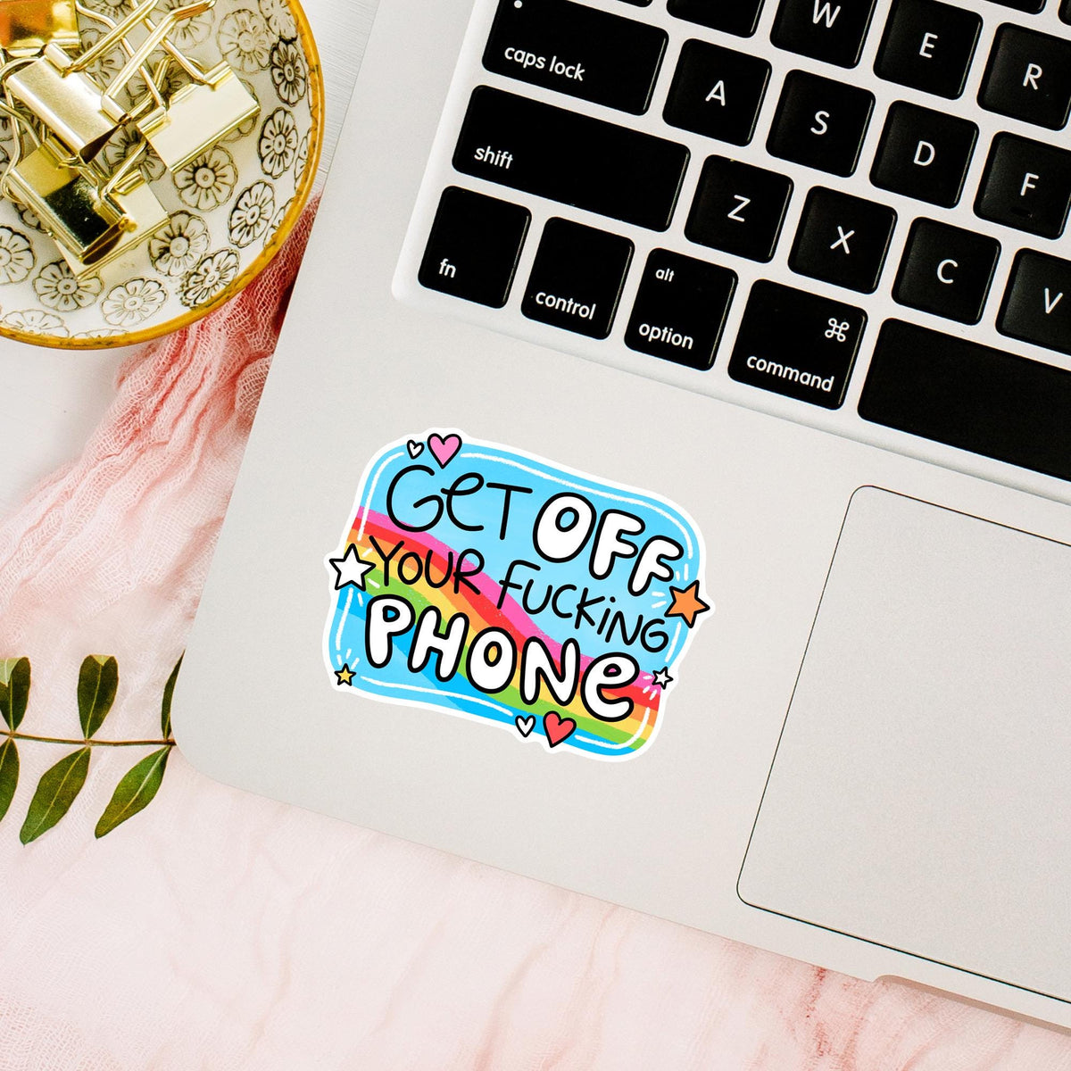 Get Off Your Phone waterproof sticker on a laptop, sarcastic rainbow decal for digital detox and screen time humor