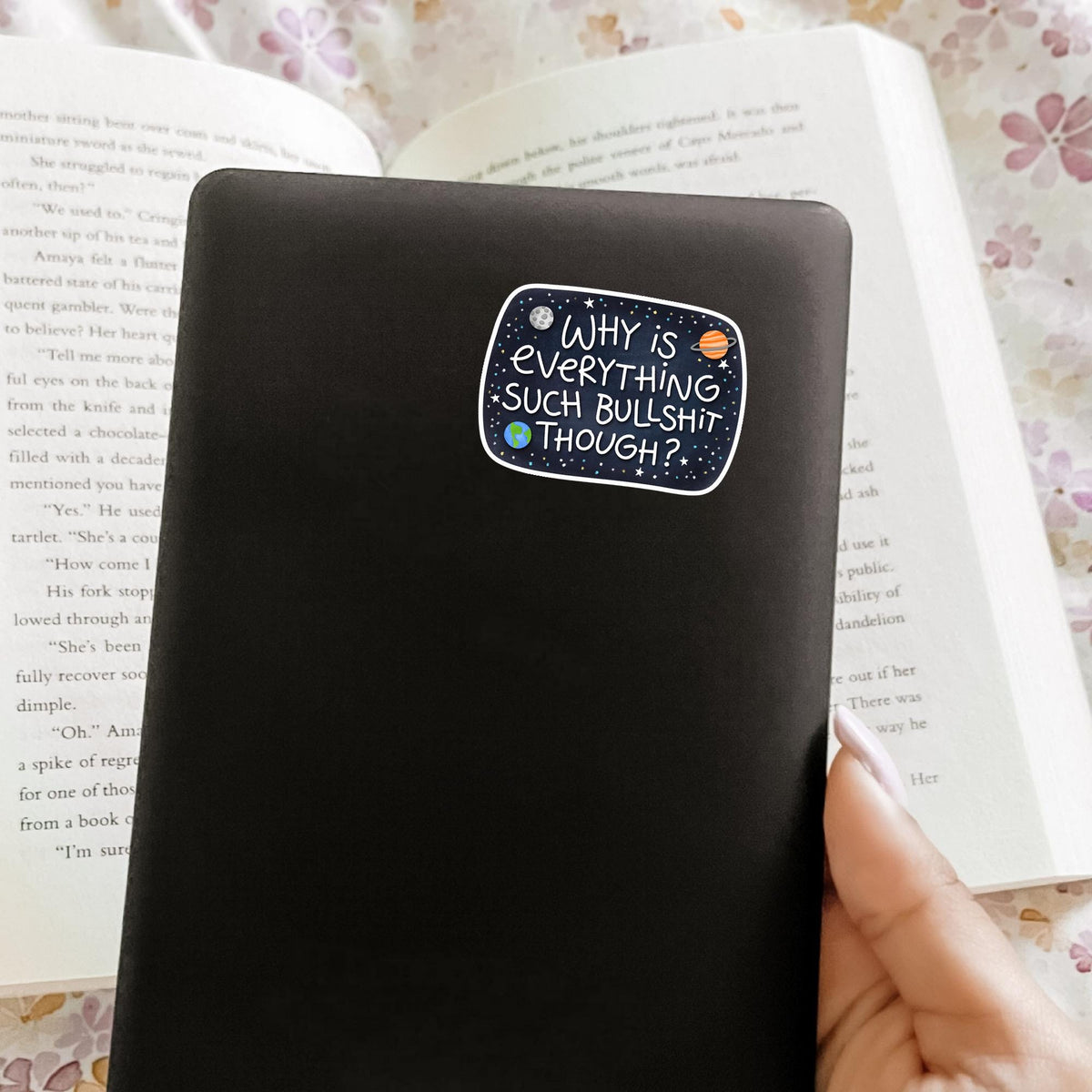 Sarcastic galaxy quote sticker on a black notebook cover, waterproof vinyl decal, coworker gag gift and office desk decor