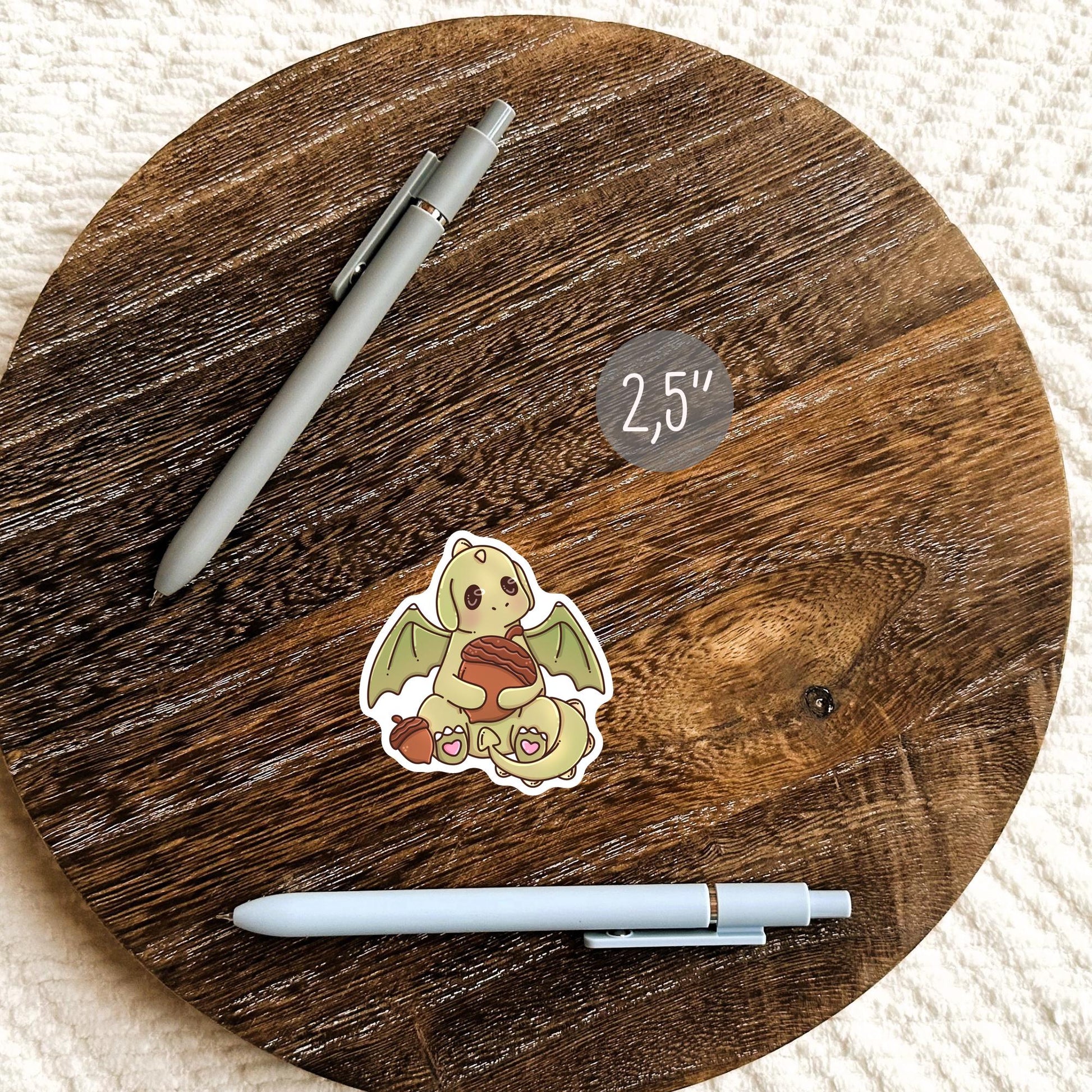 Cute Autumn Green Dragon sticker on a water bottle, cozy fall vinyl sticker gift for her and fantasy readers