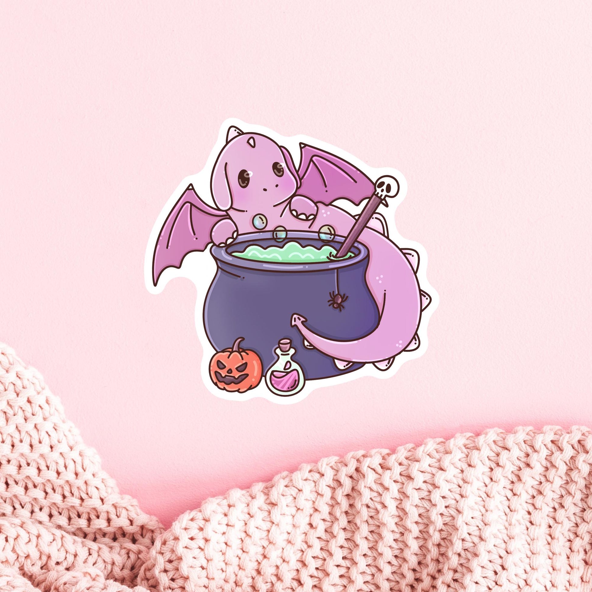 Halloween Pink Dragon sticker on a laptop, spooky pastel fantasy vinyl sticker gift for dragon and book lovers